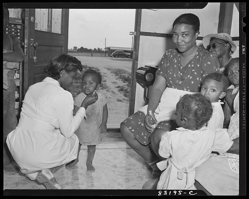 Untitled photo, possibly related to: Bridgeton, New Jersey. FSA (Farm Security Administration) agricultural workers' camp. The camp doctor has a large practice in Bridgeton, but also gives his time to the migrant camp, where he works to curb venereal disease, malnutrition, and general rundown condit