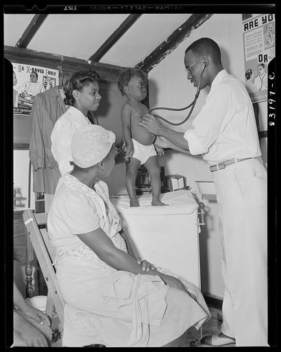 Untitled photo, possibly related to: Bridgeton, New Jersey. FSA (Farm Security Administration) agricultural workers' camp. The camp doctor has a large practice in Bridgeton, but also gives his time to the migrant camp, where he works to curb venereal disease, malnutrition, and general rundown condit