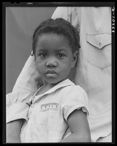Bridgeton, New Jersey. FSA (Farm Security Administration) agricultural workers' camp. Daughter of a migrant who lives at the camp