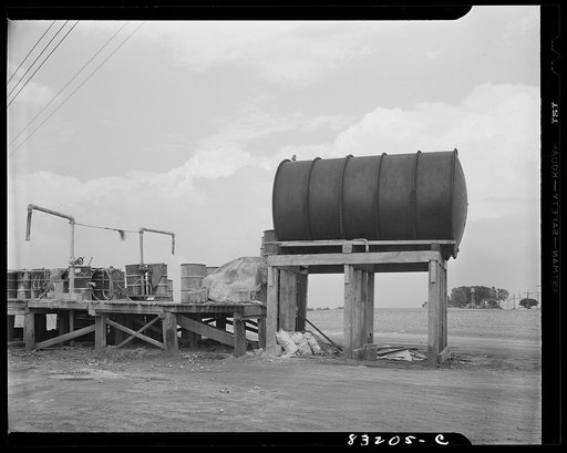 Bridgeton, New Jersey. FSA (Farm Security Administration) agricultural workers' camp. Tanks which contain spray for the orchard