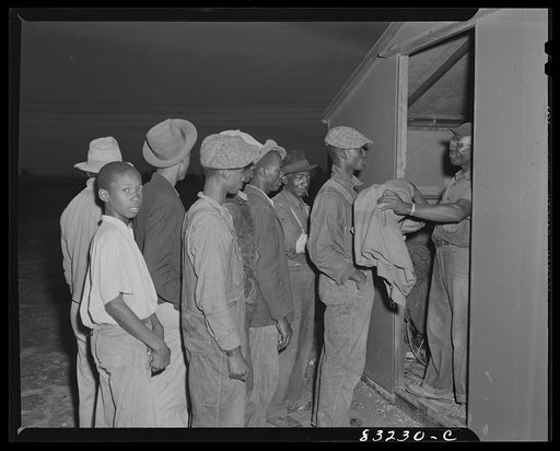 Bridgeton, New Jersey. FSA (Farm Security Administration) agricultural workers' camp. Migratory workers getting blankets