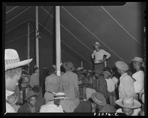 Bridgeton, New Jersey. FSA (Farm Security Administration) agricultural workers' camp. Assistant supervisor of the government camp addressing the migrants who have just arrived from Florida