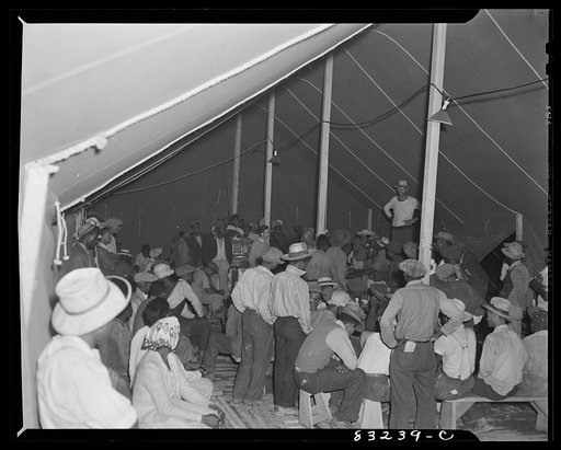 Untitled photo, possibly related to: Bridgeton, New Jersey. FSA (Farm Security Administration) agricultural workers' camp. Assistant supervisor of the government camp addressing the migrants who have just arrived from Florida