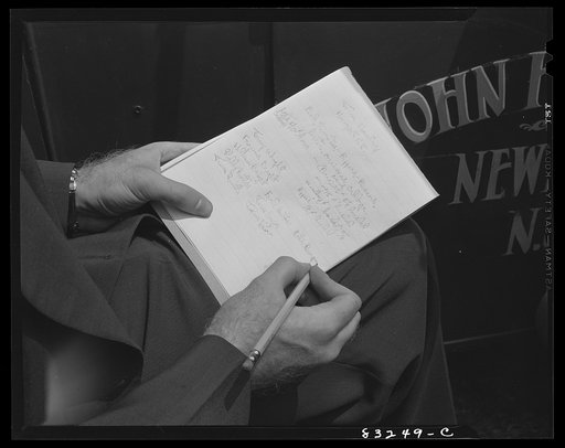 Bridgeton, New Jersey. United States employment agent writing out the contract for John Hanby, freeholder farmer who has contracted for pickers