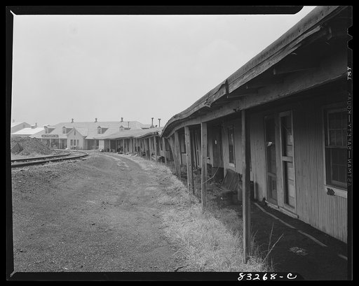 Bridgeton, New Jersey. Seabrook Farm. Condemned quarters built for migrants but now serving as storage bins