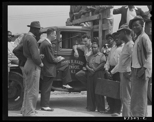 Bridgeton, New Jersey. FSA (Farm Security Administration) agricultural workers' camp. George Price, United States employment agent writing up contract for the pickers whom John Hanby is taking to his own farm to live and work