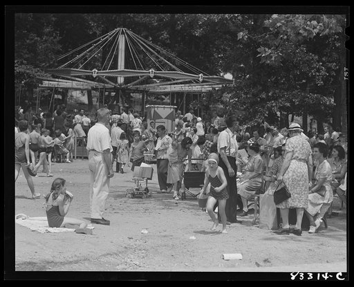Untitled photo, possibly related to: Bridgeton, New Jersey. Getting tickets for merry-go-round Fourth of July picnic