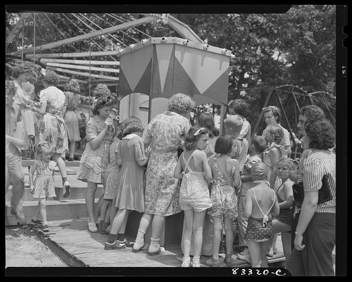 Bridgeton, New Jersey. Getting tickets for merry-go-round Fourth of July picnic
