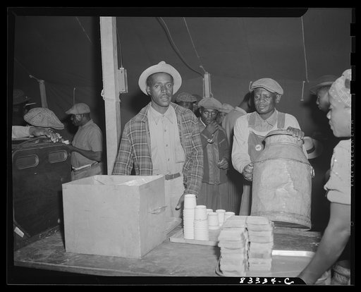 Untitled photo, possibly related to: Bridgeton, New Jersey. FSA (Farm Security Administration) agricultural workers' camp. Hot coffee and sandwiches were served to the migrant workers just arrived from Florida