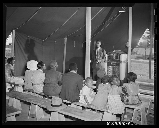 Untitled photo, possibly related to: Bridgeton, New Jersey. FSA (Farm Security Administration) agricultural workers' camp. Religious service