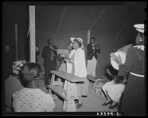 Untitled photo, possibly related to: Bridgeton, New Jersey. FSA (Farm Security Administration) agricultural workers' camp. Negro revivalist