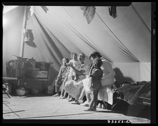 Untitled photo, possibly related to: Bridgeton, New Jersey. FSA (Farm Security Administration) agricultural workers' camp. Cooking on kerosene stove