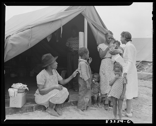 Bridgeton, New Jersey. FSA (Farm Security Administration) agricultural workers' camp. The camp nurse making a call