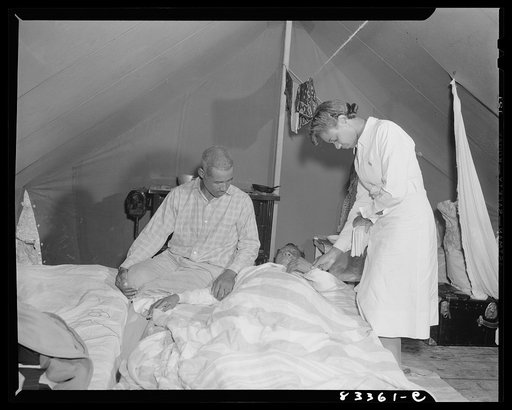Bridgeton, New Jersey. FSA (Farm Security Administration) agricultural workers' camp. Camp nurse paying a call on women who contracted pleurisy coming up from Florida on an overcrowded truck