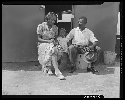 Bridgeton, New Jersey. FSA (Farm Security Administration) agricultural workers' camp. Councilman and family on the stoop of their house