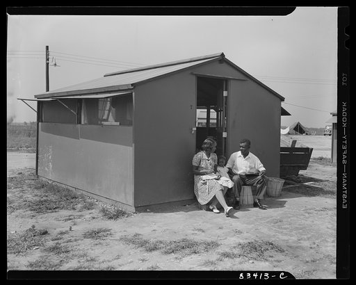 Bridgeton, New Jersey. FSA (Farm Security Administration) agricultural workers' camp. Councilman on the stoop of his house