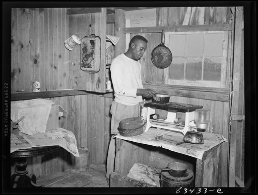 Bridgeton, New Jersey. Migrant who lives alone in a barn on the farm where he works
