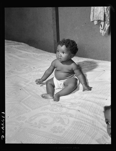 Bridgeton, New Jersey. FSA (Farm Security Administration) agricultural workers' camp. Migrant baby