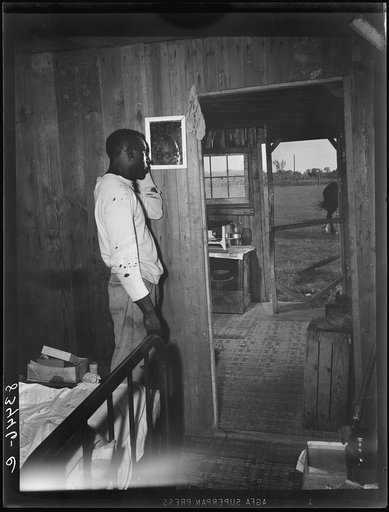 Bridgeton, New Jersey. FSA (Farm Security Administration) agricultural workers' camp. Picker and farmhand who lives by himself in the corner of an old barn by himself on a farm