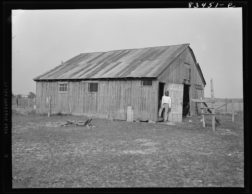 Bridgeton, New Jersey. FSA (Farm Security Administration) agricultural workers' camp. Picker and farmhand who lives in the corner of an old barn by himself on a farm