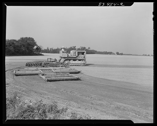 Untitled photo, possibly related to: Harrowing fields with diesel tractors at Seabrook Farms. Bridgeton, New Jersey