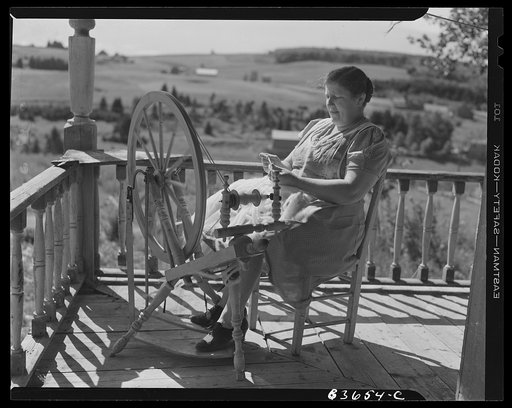 Fort Kent, Maine (vicinity). Wife of Albert [i.e. Leonard] Gagnon, Acadian FSA (Farm Security Administration) client, spinning domestic wool for knitting