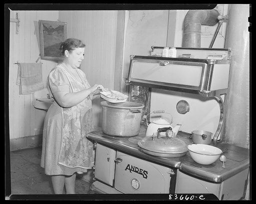 Fort Kent, Maine (vicinity). Mrs. [Leonard] Gagnon at stove