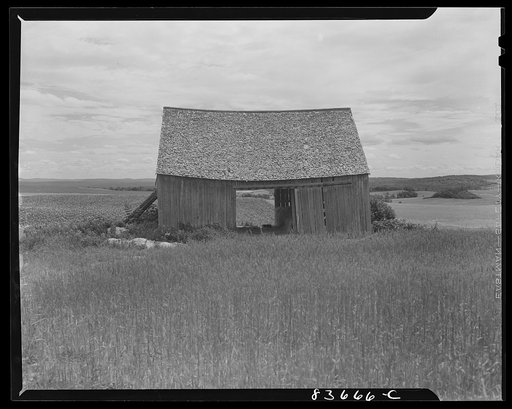 Fort Kent, Maine. (vicinity). Barn built by [Leonard] Gagnon's father on the uplands where he raises potatoes, barley, buckwheat, oats and wheat