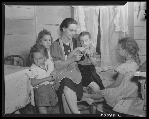 Untitled photo, possibly related to: Fort Kent, Maine (vicinity). Daughters of the industrious Acadian farmers learn to knit as soon as they learn to walk