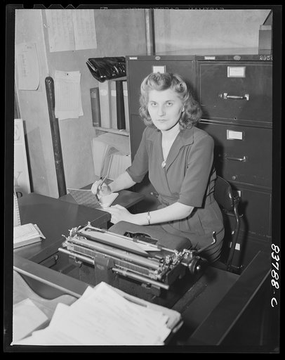 Windsor Locks, Connecticut. Polish farmer's daughter works as a secretary during the week and helps on the farm on her free days