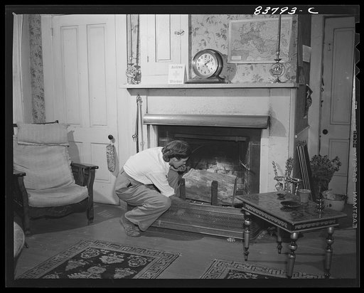 Hartford, Connecticut (vicinity). Living room on the Komorosky farm. On mantel is a clock presented to the Captain for salvaging a tanker for the Standard Oil Company