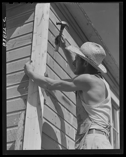 Jewett City, Connecticut (vicinity). Estonian farmer enlarging poultry house. He has a FSA (Farm Security Administration) loan