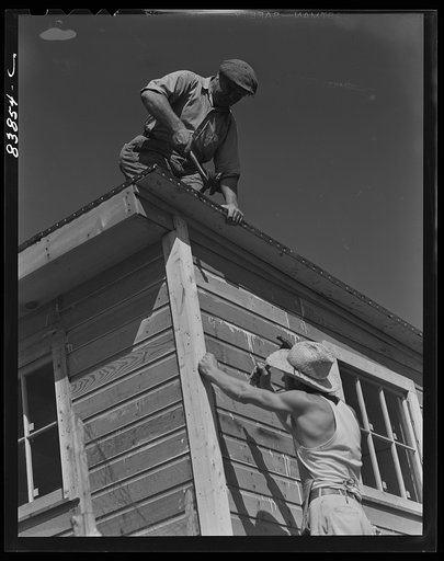 Untitled photo, possibly related to: Jewett City, Connecticut (vicinity). Estonian farmer enlarging poultry house. He has a FSA (Farm Security Administration) loan