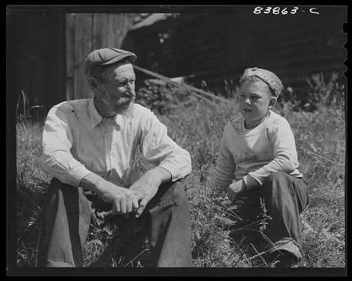 Windsor Locks, Connecticut (vicinity). Jewish rabbi and farmer talking things over with German boy who lives down the road