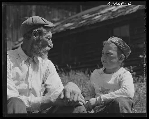 Untitled photo, possibly related to: Windsor Locks, Connecticut (vicinity). Jewish rabbi and farmer talking things over with German boy who lives down the road