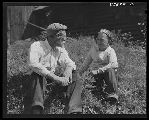 Windsor Locks, Connecticut (vicinity). Jewish rabbi and farmer talking things over with German boy who lives down the road
