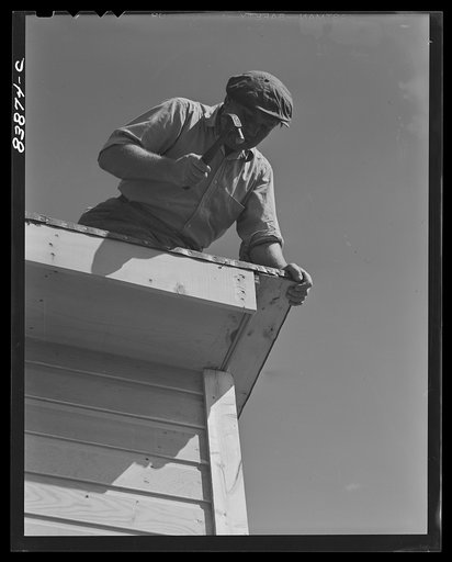 Jewett City, Connecticut (vicinity). Estonian farmer enlarging poultry house. He has a FSA (Farm Security Administration) loan