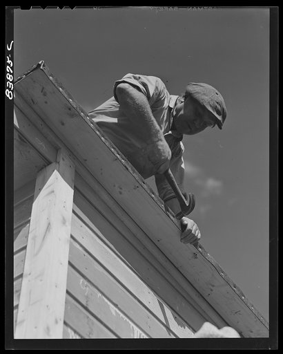 Jewett City, Connecticut (vicinity). Estonian farmer enlarging poultry house. He has a FSA (Farm Security Administration) loan
