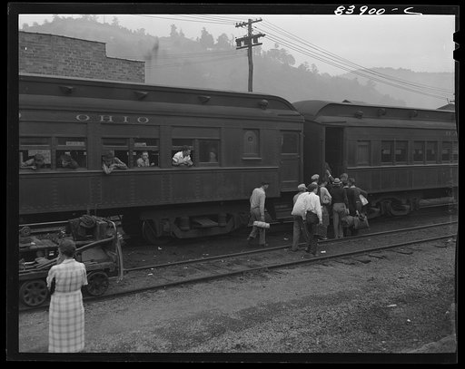 Richwood, West Virginia. Boys boarding train for Batavia, New York, where they will work in the harvest