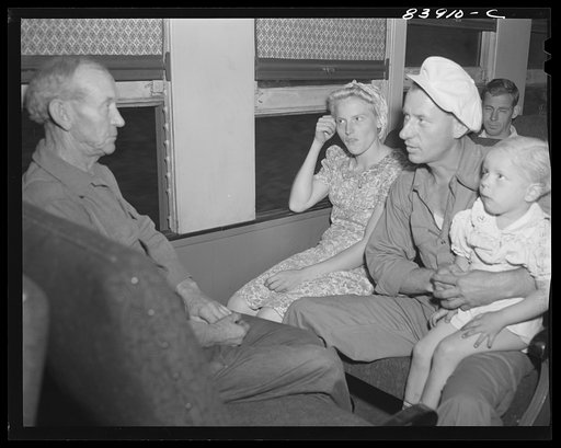 Richwood, West Virginia. The Friend family aboard the train which carried them to Batavia, New York to help with the harvesting