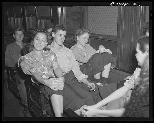 Richwood, West Virginia. Boys and girls aboard special train carrying them to Batavia, New York to help with the harvest