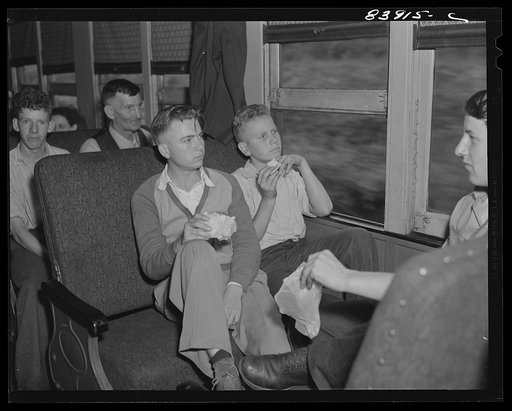 Sandwiches were served free aboard the special train carrying migratory workers to upper New York state to bring in the crops