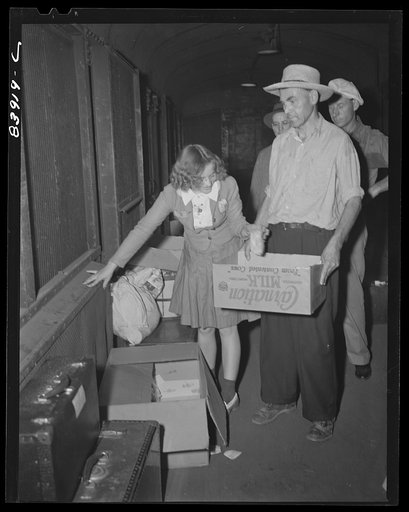 Sandwiches were served free aboard the special train carrying migratory workers to upper New York state to bring in the crops