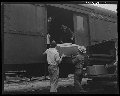 Richwood, West Virginia. Loading sandwiches aboard special train which will carry migratory workers to New York state