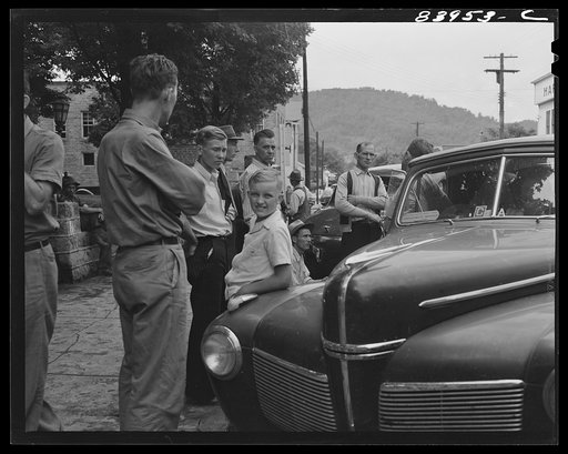 Untitled photo, possibly related to: Summersville, West Virginia. United States employment agent recruiting labor to bring in the harvest in New York state