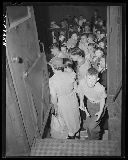 Untitled photo, possibly related to: Richwood, West Virginia. Migratory workers boarding train to go to Batavia, New York to work during the farm labor storage