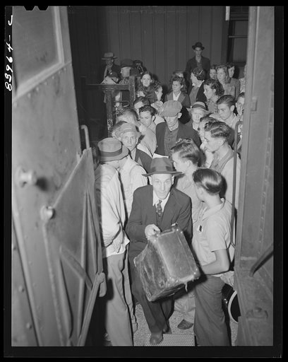 Richwood, West Virginia. Migratory workers boarding train to go to Batavia, New York to work during the farm labor storage