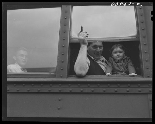 Richwood, West Virginia. Migratory worker and his little girl leaving Richwood for upper New York state to work during the farm labor storage