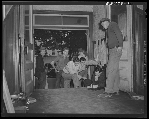 Summersville, West Virginia. FSA (Farm Security Administration) representative recruiting labor on the courthouse steps