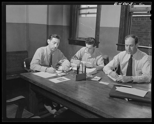 Untitled photo, possibly related to: Richwood, West Virgninia. The mayor's office was used as a recruiting hall for the FSA (Farm Security Administration) supervised labor migration